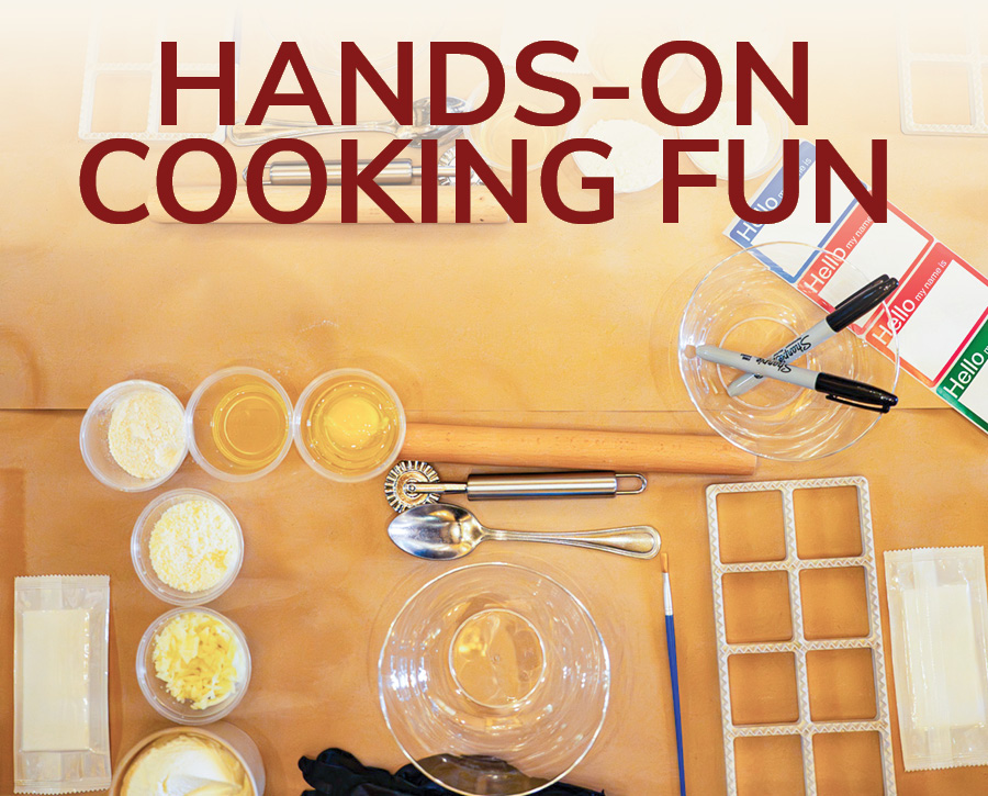 Fully prepped kid stations with ingredients and tools for a hands-on ravioli-making experience.